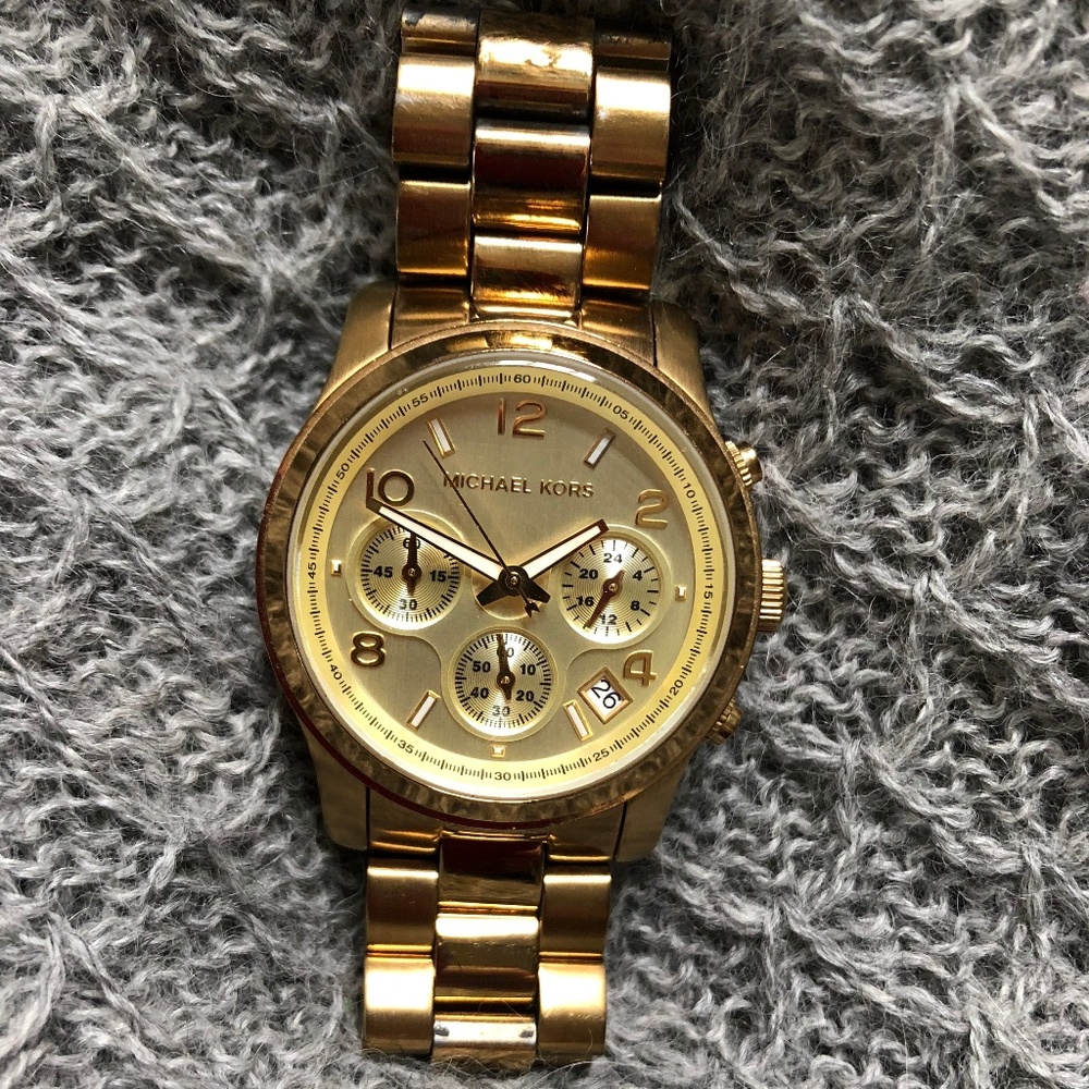 Gold Michael Kors women's wristwatch